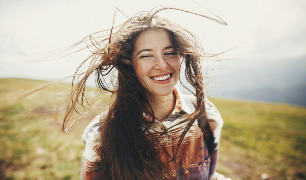 woman in wind in the nature. relationship stockholm couples therapy women's work. 